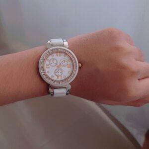 white stainless watch